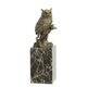 A BRONZE SCULPTURE OF A LONG-EARED OWL