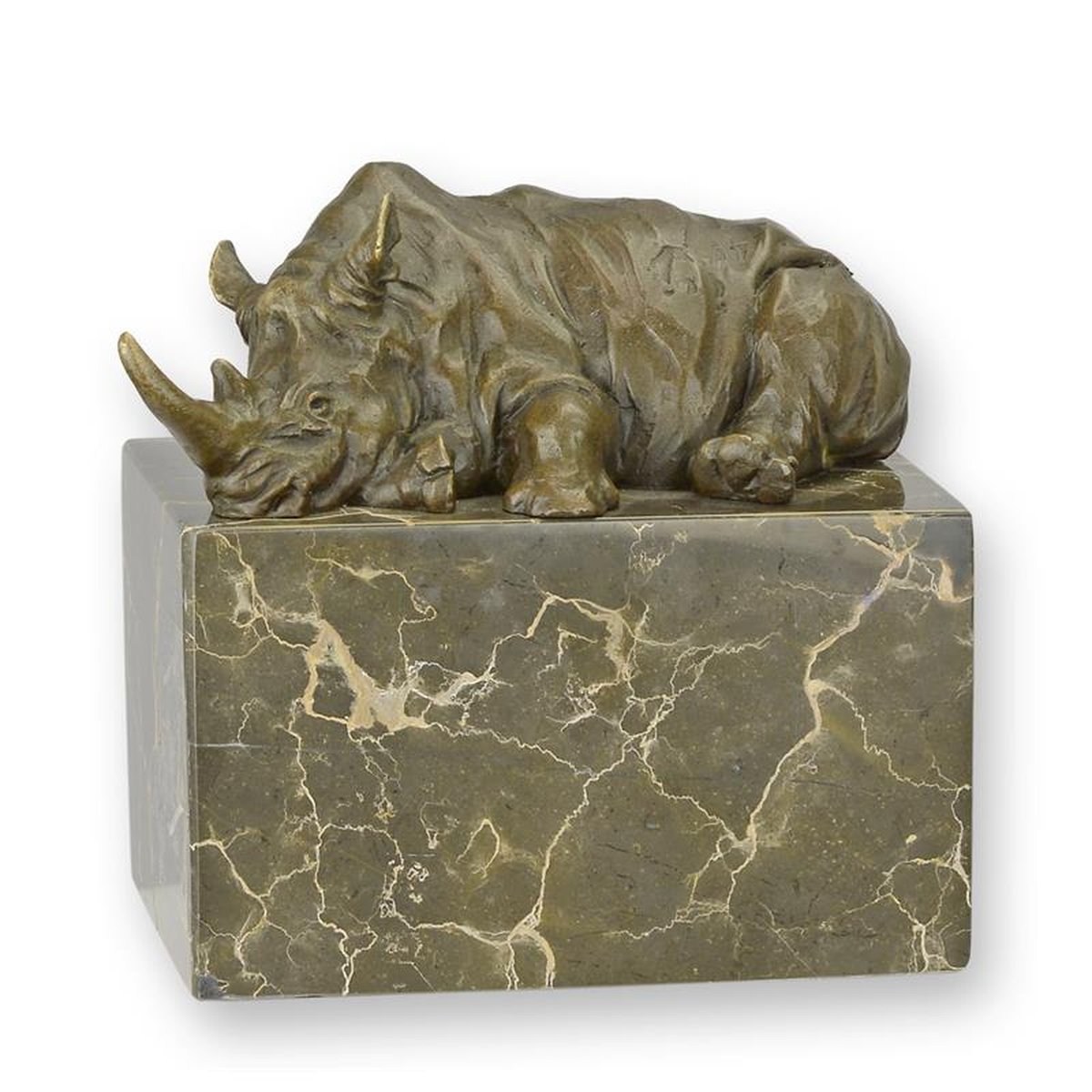 A BRONZE SCULPTURE OF A LYING RHINOCEROS