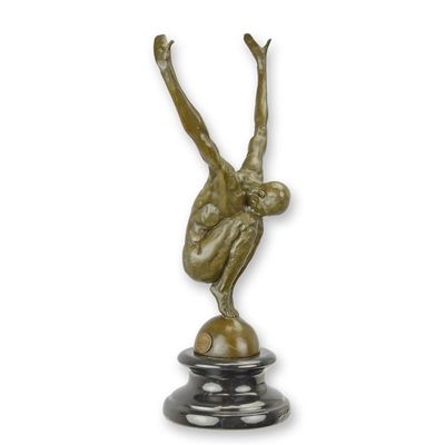 A BRONZE SCULPTURE OF A MALE NUDE IN DIVING POSITION