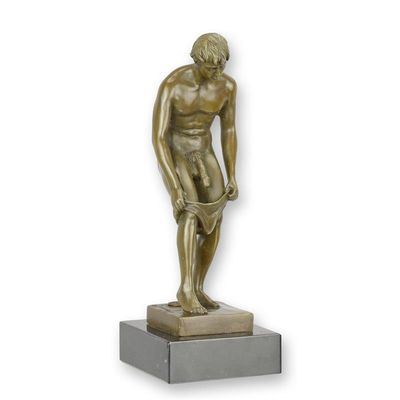 A BRONZE SCULPTURE OF A MALE NUDE