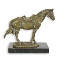 A BRONZE SCULPTURE OF A MOUNTED HORSE