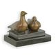 A BRONZE SCULPTURE OF A PAIR OF PIGEONS