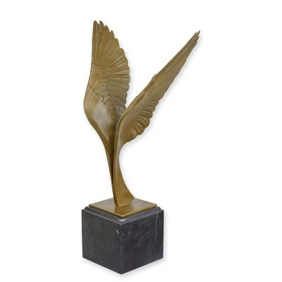 A BRONZE SCULPTURE OF A PAIR OF WINGS