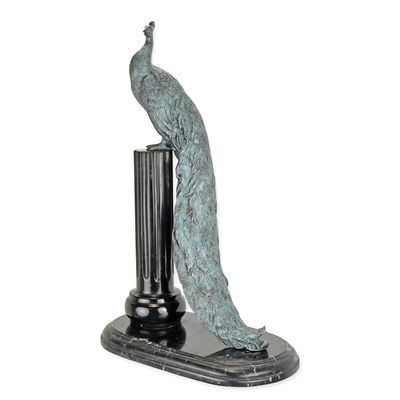 A BRONZE SCULPTURE OF A PEACOCK