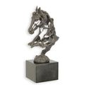 A BRONZE SCULPTURE OF A PIERCED HORSE HEAD