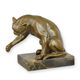 A BRONZE SCULPTURE OF A PLAYING CAT