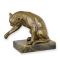 A BRONZE SCULPTURE OF A PLAYING CAT