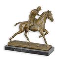 A BRONZE SCULPTURE OF A POLO PLAYER