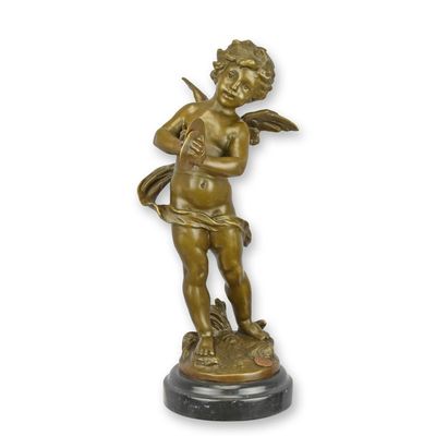 A BRONZE SCULPTURE OF A PUTTO PLAYING CYMBALS