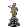 A BRONZE SCULPTURE OF A PUTTO PLAYING DRUMS