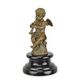 A BRONZE SCULPTURE OF A PUTTO PLAYING FLUTE