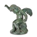A BRONZE SCULPTURE OF A PUTTO