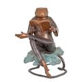 A BRONZE SCULPTURE OF A READING FROG