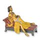 A BRONZE SCULPTURE OF A RECLINING CLEOPATRA