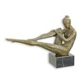 A BRONZE SCULPTURE OF A RECLINING FEMALE NUDE