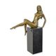 A BRONZE SCULPTURE OF A RECLINING NUDE