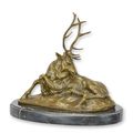 A BRONZE SCULPTURE OF A RECUMBENT STAG
