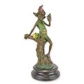 A BRONZE SCULPTURE OF A RESTING GOBLIN