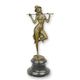 A BRONZE SCULPTURE OF A REVUE DANCER
