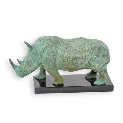 A BRONZE SCULPTURE OF A RHINOCEROS - OLD GREEN