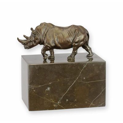 A BRONZE SCULPTURE OF A RHINOCEROS