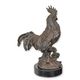 A BRONZE SCULPTURE OF A ROOSTER