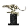 A BRONZE SCULPTURE OF A RUNNING JAGUAR