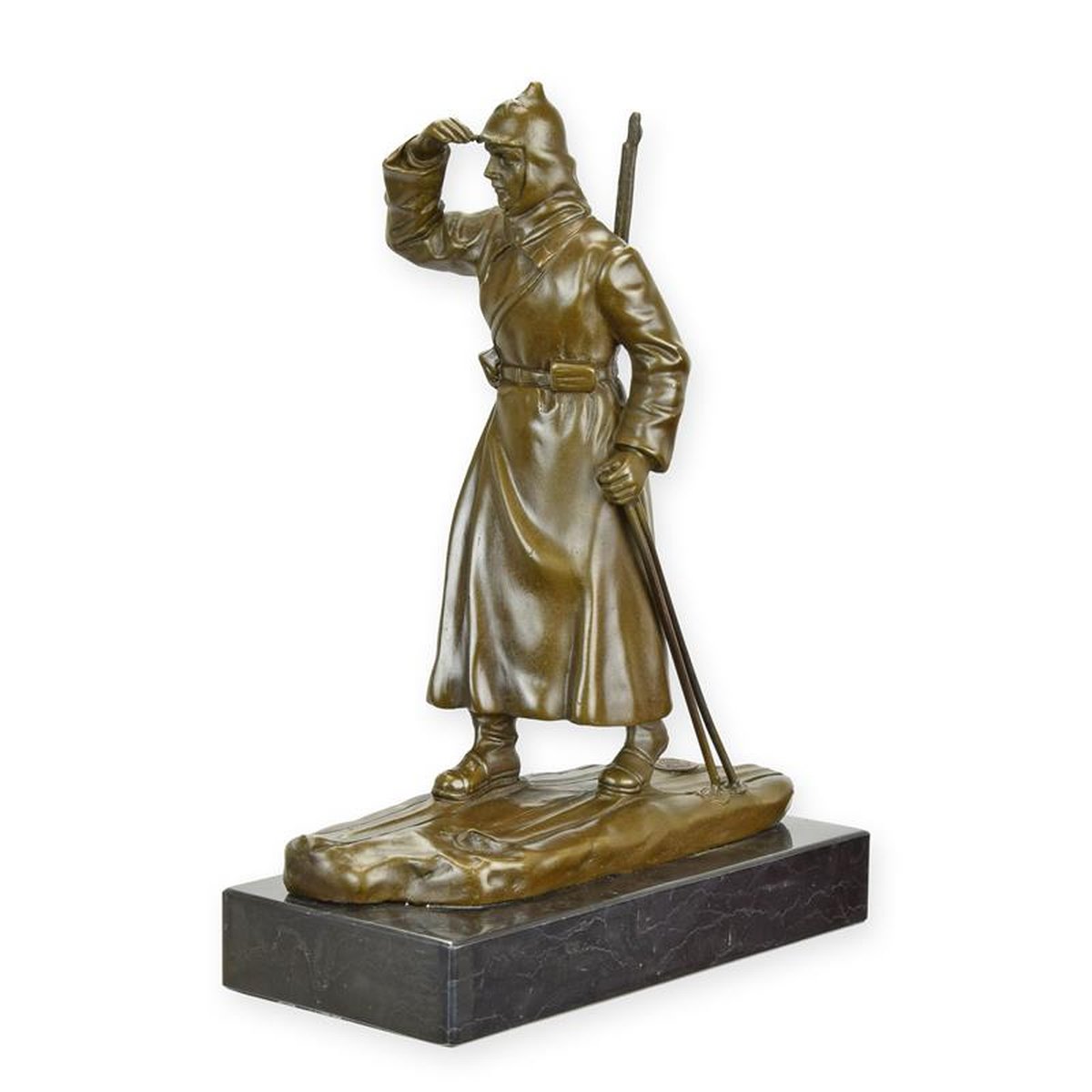A BRONZE SCULPTURE OF A RUSSIAN SOLDIER ON SKIES