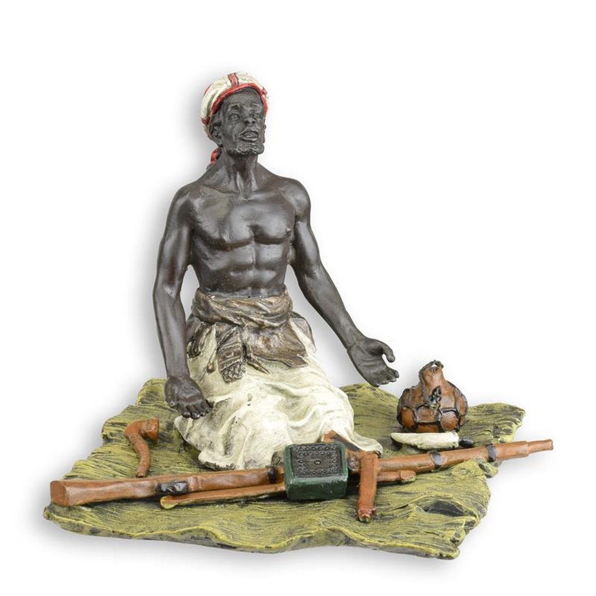 A BRONZE SCULPTURE OF A SEATED ARMS DEALER