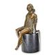 A BRONZE SCULPTURE OF A SEMI NUDE FEMALE