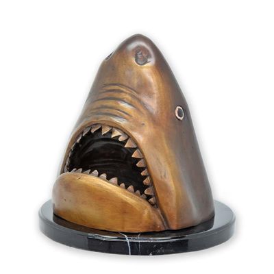 A BRONZE SCULPTURE OF A SHARK HEAD