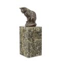 A BRONZE SCULPTURE OF A SITTING CAT