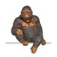 A BRONZE SCULPTURE OF A SITTING GORILLA