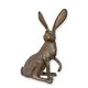 A BRONZE SCULPTURE OF A SITTING HARE