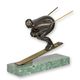 A BRONZE SCULPTURE OF A SKIER