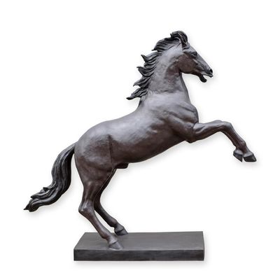 A BRONZE SCULPTURE OF A STAGGERING HORSE