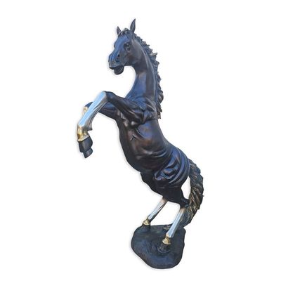 A BRONZE SCULPTURE OF A STAGGERING HORSE