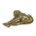 A BRONZE SCULPTURE OF A STRETCHING NUDE