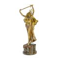 A BRONZE SCULPTURE OF A SWORD DANCER
