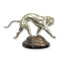 A BRONZE SCULPTURE OF A WALKING JAGUAR