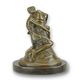 A BRONZE SCULPTURE OF A WOMAN EMBRACING A PHALLUS