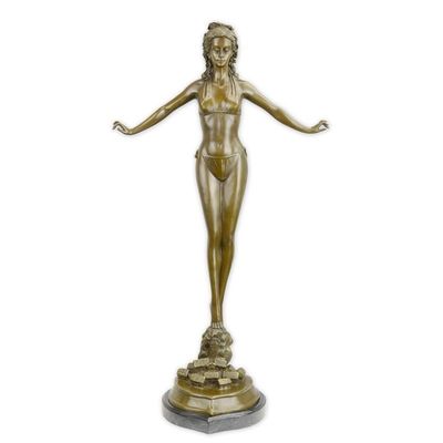 A BRONZE SCULPTURE OF A WOMAN IN BIKINI
