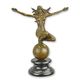 A BRONZE SCULPTURE OF A WOMAN ON TOP OF THE WORLD