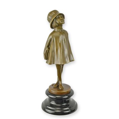 A BRONZE SCULPTURE OF A YOUNG SCHOOL GIRL