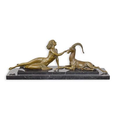 A BRONZE SCULPTURE OF AN AMAZONE WITH ANTILOPE