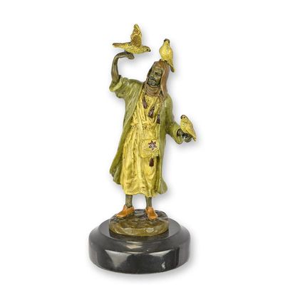 A BRONZE SCULPTURE OF AN ARAB FALCONER