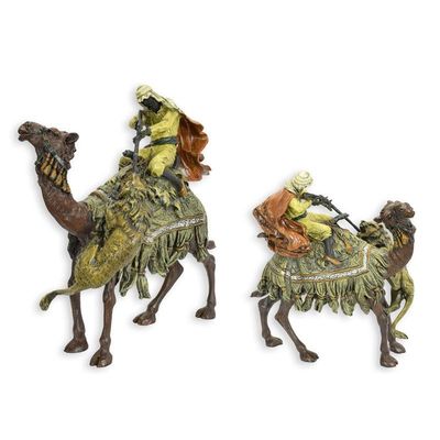 A BRONZE SCULPTURE OF AN ARAB HUNTER ON CAMEL