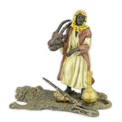 A BRONZE SCULPTURE OF AN ARAB HUNTER