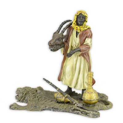A BRONZE SCULPTURE OF AN ARAB HUNTER