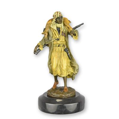 A BRONZE SCULPTURE OF AN ARAB HUNTER WITH PREY